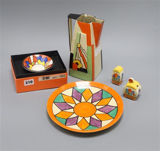 A Clarice Cliff Bizarre plate, a crocus cruet, a modern Clarice Cliff dish and a Clarice Cliff-style jug